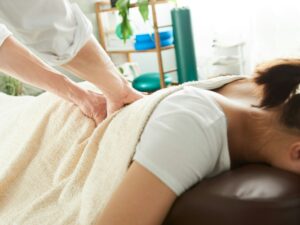 Japanese woman receiving a waist massage